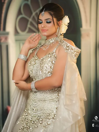 The closed-eye shot is perfect for showcasing detailed eyeshadow work, like this soft blue and silver combination.