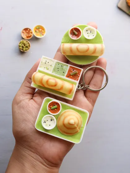 A collection of different dosa miniatures, including the popular cone dosa and paper roast. My online class covers the techniques to achieve these distinct shapes and textures.