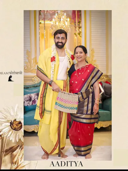 A portrait of the groom, Aaditya, with his mother, both dressed in traditional South Indian wedding attire.