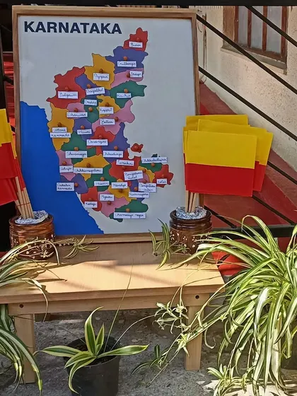 Our setup for Kannada Rajyotsava, with a map of Karnataka and state flags.