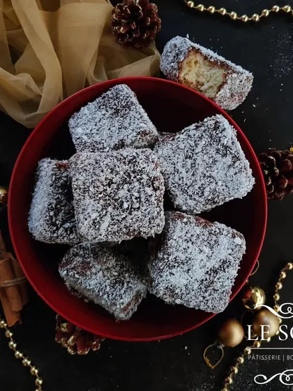 Lamingtons are a crowd-pleaser, and I always bring them back for Christmas. These are fluffy vanilla buttercake squares dipped in chocolate icing and coated in coconut.