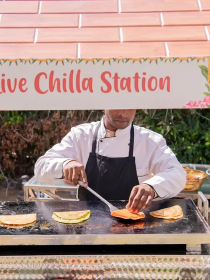 Experience the excitement of food cooked fresh for your guests with my interactive live chilla station. My chef prepares savory Indian crepes on the spot, providing both a delicious meal and an engaging culinary show.