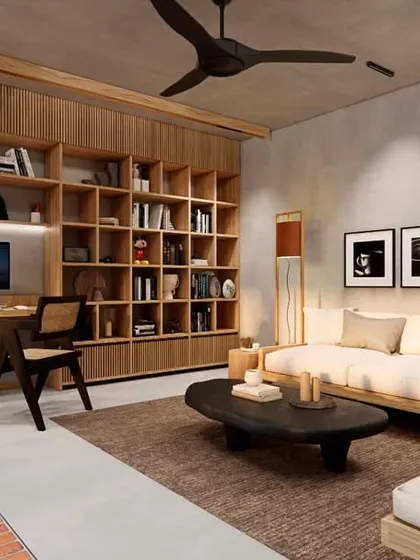 The full view of the HAUS 5 library and lounge, a comfortable interior space that feels expansive due to its connection to the large, open-air terrace.