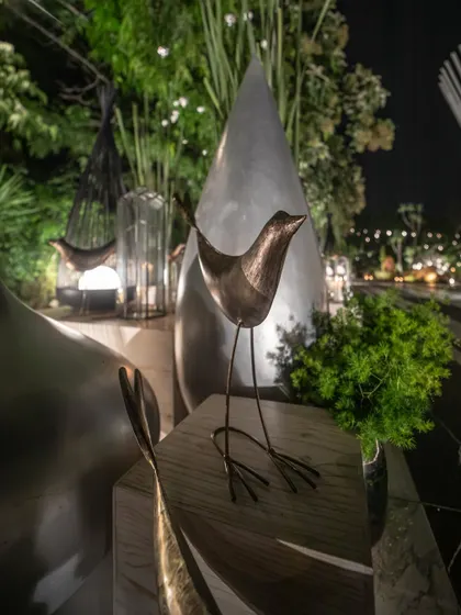 A close-up of our quirky and elegant decor accents, like these metallic bird sculptures.