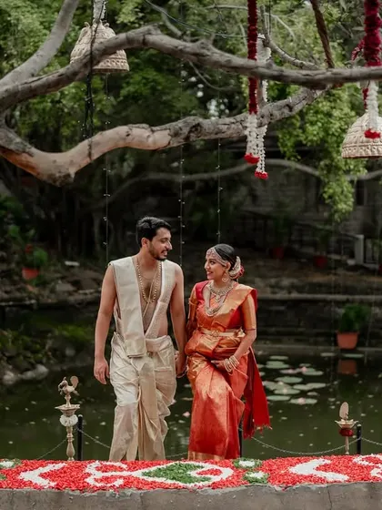 A moment of quiet connection amidst the grandeur of The Tamarind Tree. We love using the venue's stunning architecture to frame our couples, creating a story of romance and tradition.