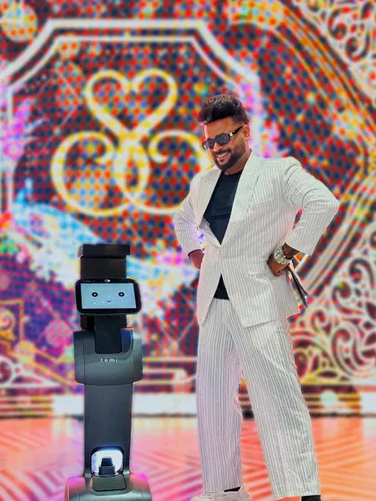 Who says a human host is always better? Here I am with my co-host for the night, Jairo the robot. We made a great team.