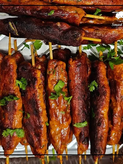 These seekh kebabs are spiced to perfection and grilled on skewers until they are juicy and flavorful. They are a fantastic addition to any festive menu.