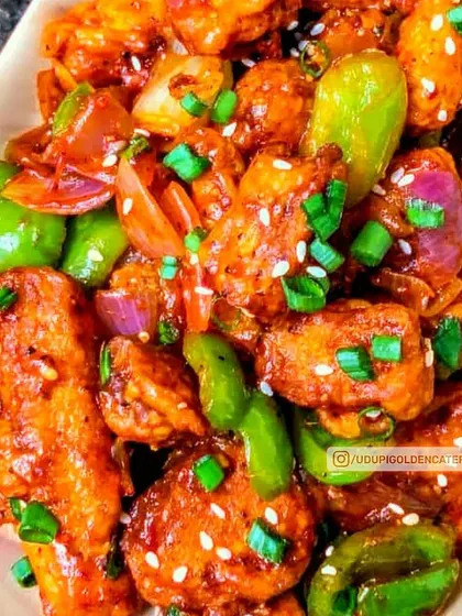 Our Chilli Paneer is a popular Indo-Chinese starter, featuring crispy paneer tossed in a tangy and spicy sauce with fresh bell peppers and onions. It is a guaranteed crowd-pleaser.