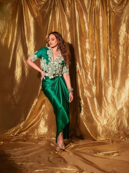For the 'Heeramandi' promotions, we styled Sonakshi Sinha in this regal green draped ensemble by Anamika Khanna. The look, complete with intricate embroidery and traditional jewelry, was designed to reflect the grandeur of the series.