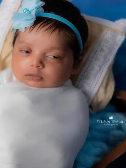 That expression is just priceless. Even at 20 days old, babies have so many little quirks and faces that I love to capture.