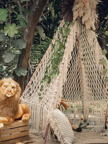 For a child's birthday, I can create a "Wild ONE" jungle theme with this adorable teepee setup. Complete with plush animal toys and a custom photo board, it makes for a memorable first birthday party.