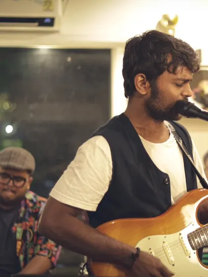 The Blues Ghat band in full swing, with the guitarist taking a solo. Our space comes alive with the soulful sounds of blues, jazz, and fusion music.