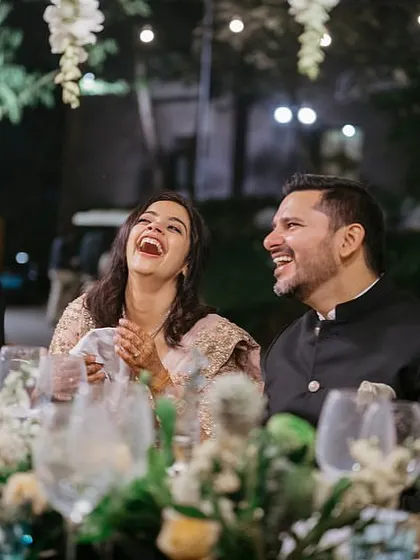 The smiles say it all. This was an intimate dinner party for Neha and Tushar in a Coorg forest, where we managed everything from setting up a satellite kitchen to ensuring the seven-course meal was served perfectly. It's these moments of pure joy that make all the meticulous planning worthwhile.