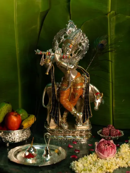 Celebrate the spirit of Janmashtami with my pure silver Krishna idol. This masterpiece of devotion and craftsmanship is perfect for your pooja room decor, festive celebrations, or as an auspicious gift of love.