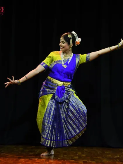 The joy of movement captured on stage. This student from our Bharatanatyam batch is performing with such grace and confidence at our annual Nritya Sanje showcase.