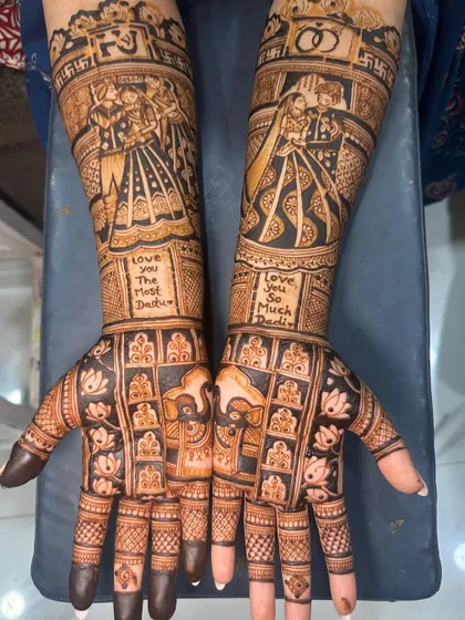 A special message for 'Dadu' (grandfather) is woven into this beautiful bridal design. It's these heartfelt touches that make the mehendi a part of the family's memories.