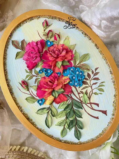 Some creations are better than you imagined. I love the combination of fiery red roses and cool blue hydrangeas in this oval panel, all framed in gold. It was a custom piece that my client absolutely adored.
