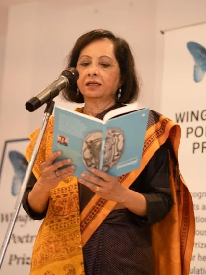 Dr. Radha Chakravarty, a distinguished poet and critic, gracing the stage at our 2023 award ceremony.