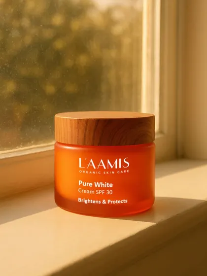 The L'AAMIS 'Pure White' Cream with SPF 30 is a perfect daily essential. It not only brightens your complexion but also provides crucial protection against sun damage.