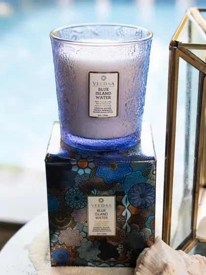 Our Blue Island Water fragrance, captured in a stunning Valeno Jar. The deep blue, hand-cut glass is reminiscent of the ocean, making it a perfect decorative piece for a refreshing, aquatic scent.