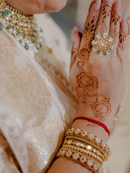 Another detail shot of the mother's jewellery, including a statement polki ring, which was part of her curated look.