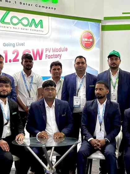 A formal team photo at our booth. My team's professionalism and expertise are the foundation of my company's success.