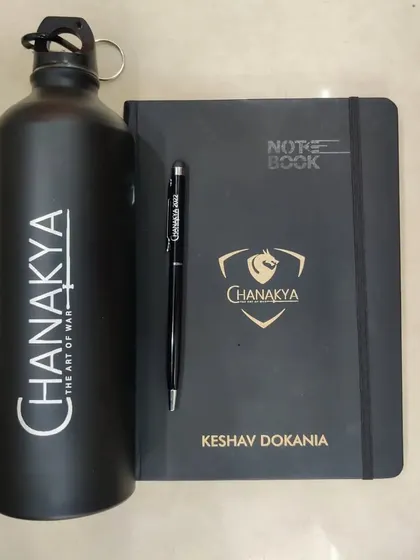This 'Art of War' themed office combo is a powerful gift for professionals. It includes a black metal bottle, a notebook, and a metal stylus pen, all customized with a name and logo.