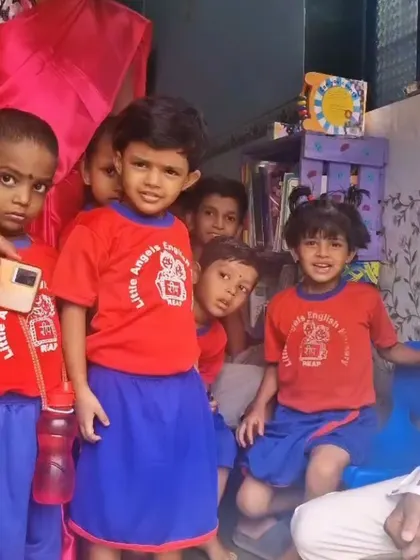 Young children at the REAP Center, ready to dive into their new books. Our goal is to make stories accessible to every child, regardless of their circumstances.