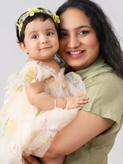 A beautiful portrait of a mother and her daughter. The bond between a mom and her baby is so special, and I aim to capture that tenderness and love in a simple, elegant portrait.