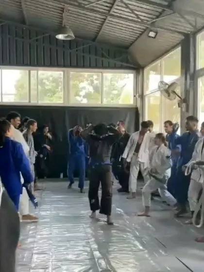 A proud moment during my BJJ blue belt grading ceremony at the Institute of Jiu-Jitsu. The journey in martial arts is one of continuous learning and I'm grateful for my coaches and training partners.
