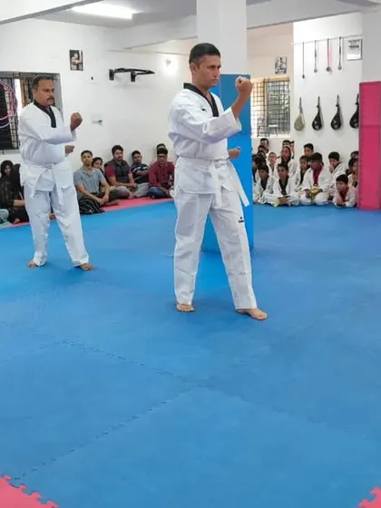 The senior students execute a block.