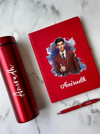 This vibrant red gift set includes a photo-printed diary, a matching personalized pen, and a temperature bottle. It's a great way to combine practical items with a personal touch.