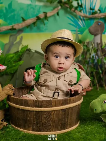Welcome to the jungle! This little explorer is ready for an adventure in our dinosaur and jungle-themed set, perfect for a six-month milestone.