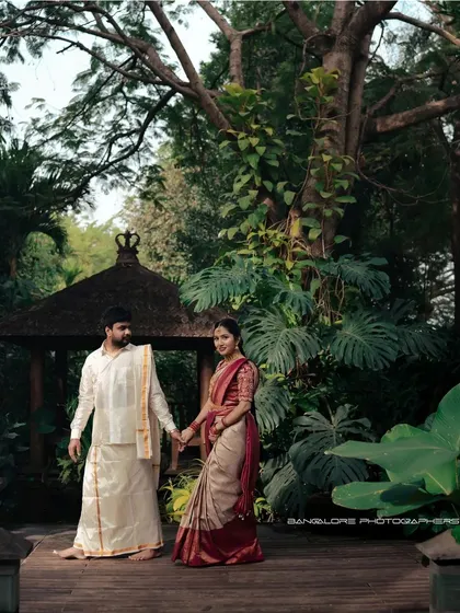 A series of photos from a post-wedding shoot in a lush, tropical garden. The couple's traditional attire looks stunning against the vibrant greenery.