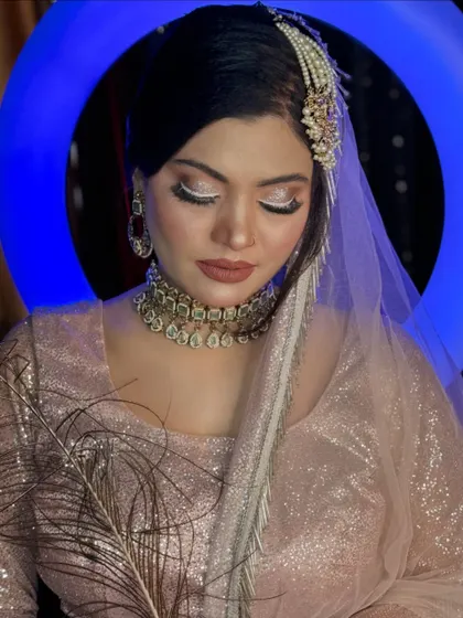 A close-up of the white graphic liner look. The precision of the liner and the soft, shimmery base create a truly unique and memorable style.