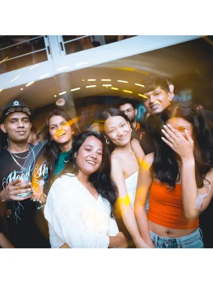 A candid shot of the crew having fun behind the decks. The energy starts with us.