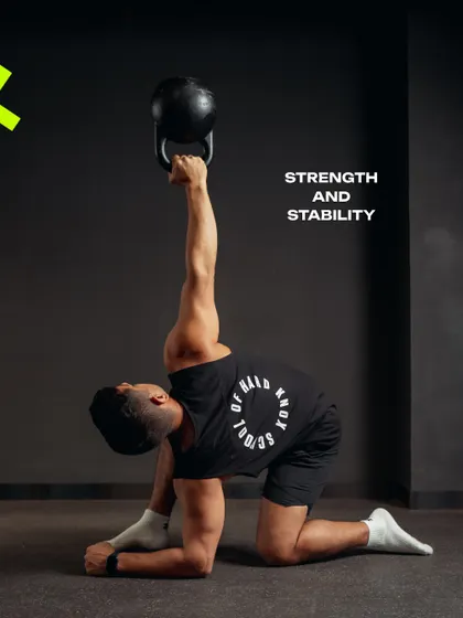 Strength isn't just about lifting heavy, it's about control and stability. This kettlebell movement, the Turkish get-up, is a perfect example of the functional strength training we focus on to build a resilient body.