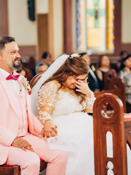 A mix of laughter and happy tears during the ceremony. Her makeup held up beautifully through all the emotions of the day.