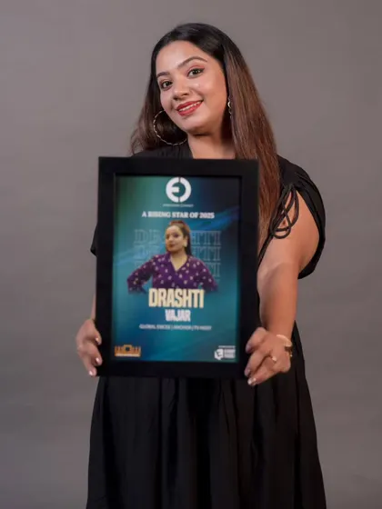 Holding my "A Rising Star of 2025" award from Entertainers Connect. This recognition is a wonderful encouragement, and I am excited for what the future holds in my journey as an emcee.