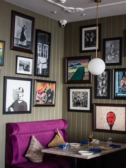 My walls are a curated collection of art that inspires me. Each piece adds to the unique character of the space.