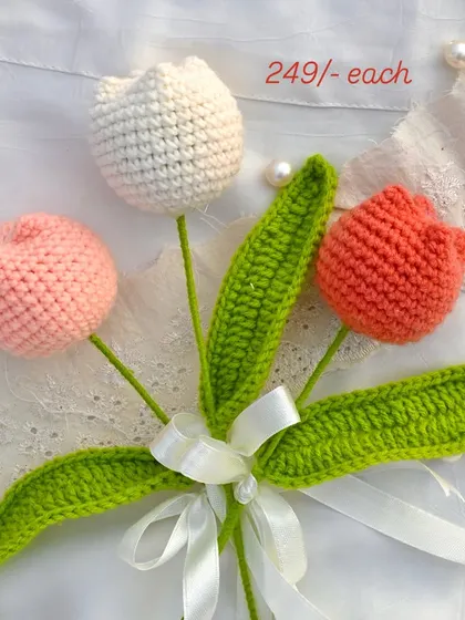 These crochet tulips are another one of our bestsellers. Available in a variety of colors like white, pink, and coral, they look beautiful on their own or in a mixed bouquet.
