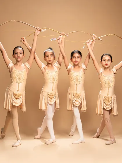 These studio portraits capture the warrior spirit of our dancers performing a piece inspired by the ballet 'Sylvia.' Holding their bows, they embody a story of conflict, courage, and resolution.