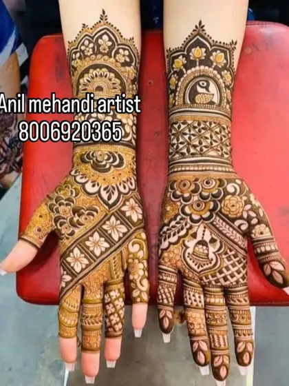 A lovely design with a mix of floral patterns and traditional motifs like a kalash and a swan. This is a great example of a semi-filled design that is both intricate and breathable.