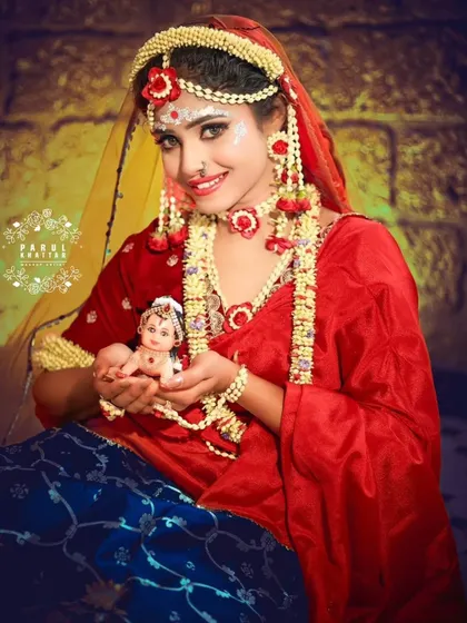 A conceptual shoot for Janmashtami, with the model dressed as Yashoda holding a baby Krishna idol. This shows my ability to create thematic and festive portraits.