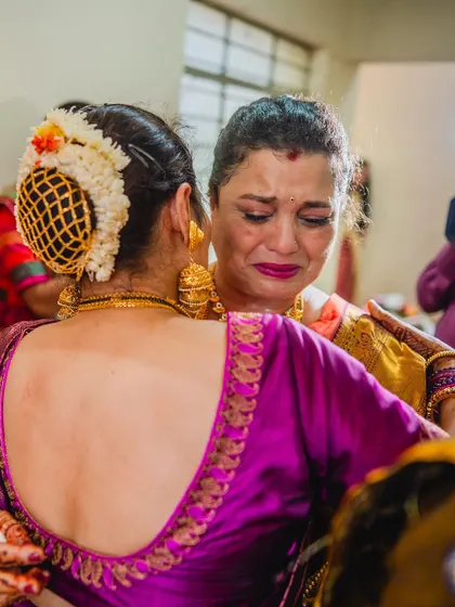 An emotional embrace between a mother and daughter. My goal is to create makeup that withstands these beautiful, unscripted moments, ensuring the bride looks her best throughout.
