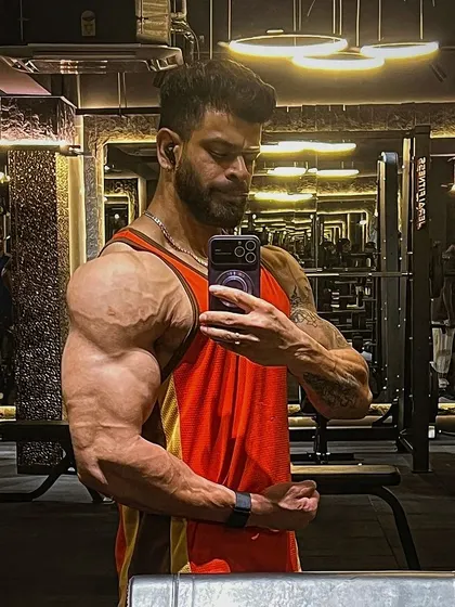 Getting back on track is a huge mood booster. Here's a post-workout selfie showing the arm and shoulder pump that comes from a great session.