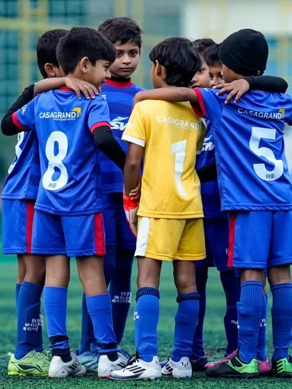 More than just a team, we are a family. This huddle before a match captures the spirit of unity and mutual support that we instill in our players from the very beginning.