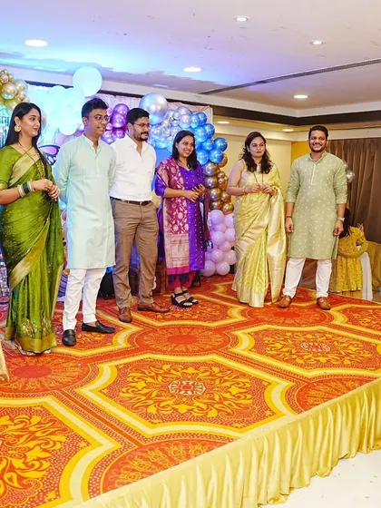 Getting family members on stage for a fun group activity at a baby shower.