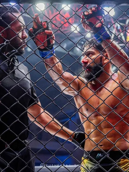 A fighter listening to his corner between rounds. The bond between a fighter and his coach is critical.