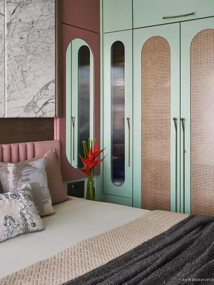 The master bedroom wardrobe with its unique capsule-like forms and combination of materials.